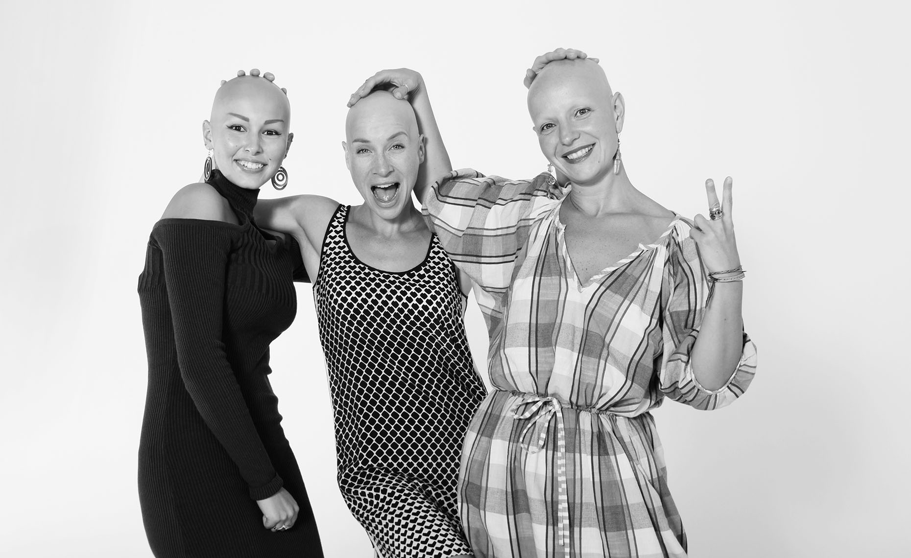 Portrait of Three Happy Bald Women